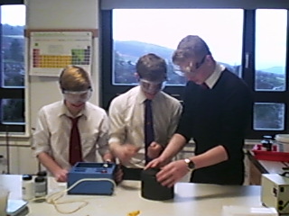 Pupils extracting metal from ore.